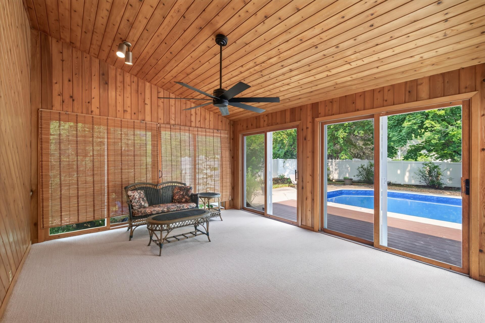 Direct access to the pool oasis from the three season porch!