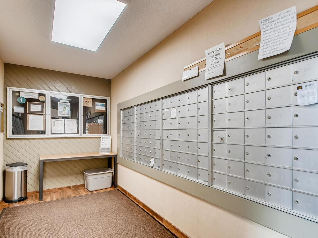 No more collecting your mail outside in the rain! This mail room is right inside the main door.