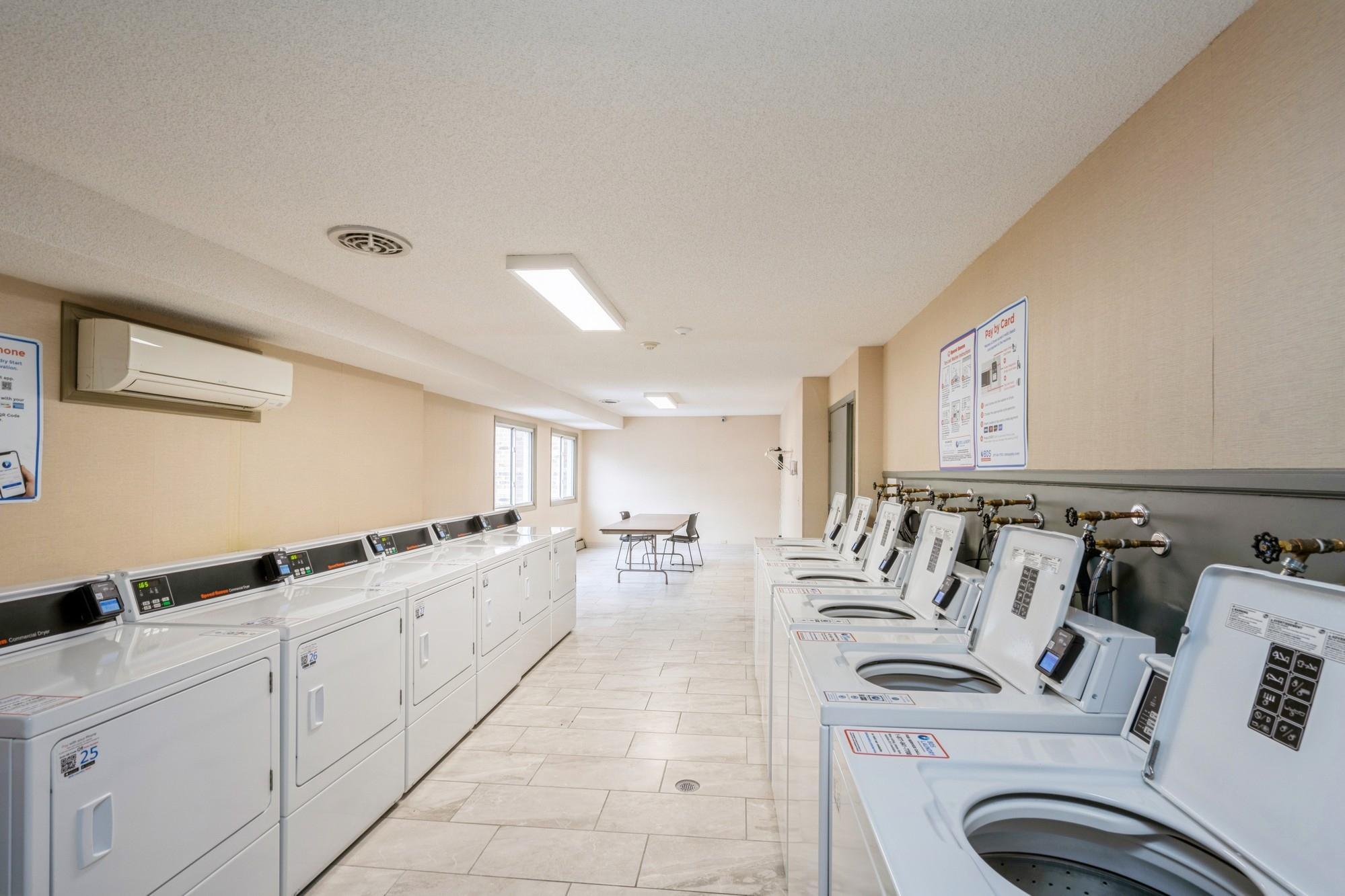 The laundry machines are electronic so you can pay with a credit or debit card and with an app it will alert you when your load is done!
