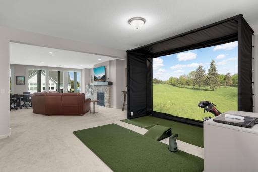 Oversized lower level with 9 foot ceilings and enough room for a golf simulator.
