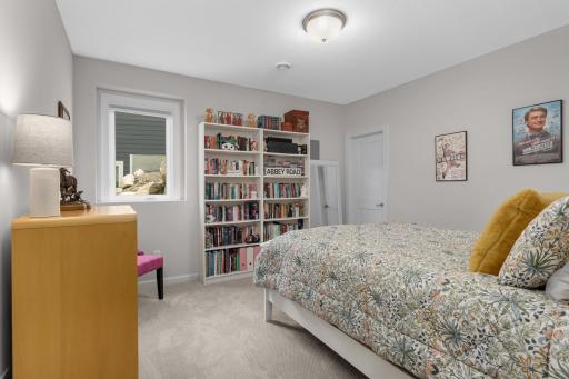 One of two lower level bedrooms that share a full bath.