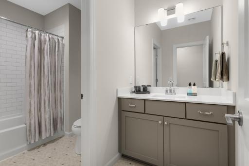 Lower level full bath with seperate shower room.