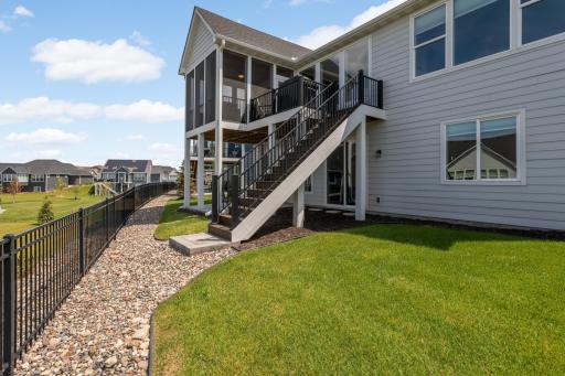 Screened Porch with access to deck with stairs to grade.