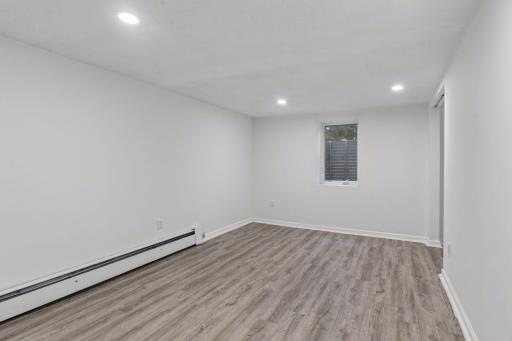 Lower level 4th bedroom with egress window.