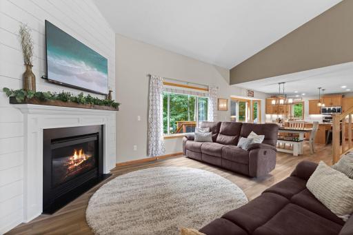 Main floor living room with gas fireplace and updated surround
