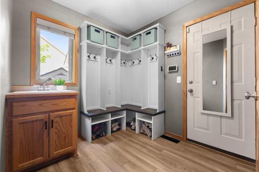 Everyone needs a mudroom, you'll find this right off the garage entrance