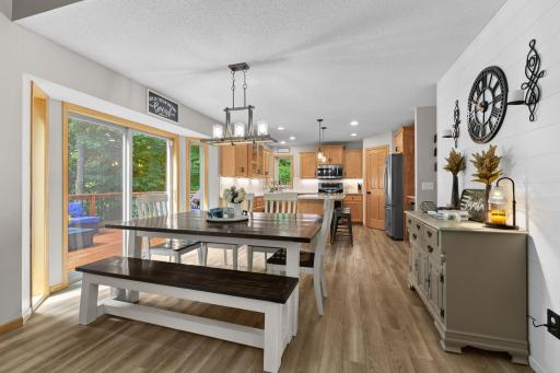 The informal dining area connects the kitchen and living room together, perfect for entertaining!