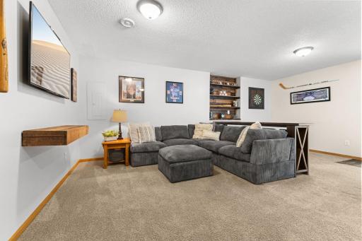 Step downstairs to the open and inviting family room
