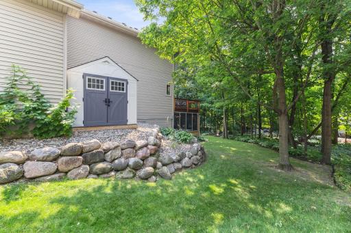 Great boulder retaining walls. The portable storage shed remains.