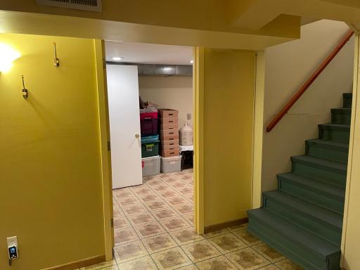Lower Level - at the bottom of the stairs, to the right, is the 3rd Non-Conforming Bedroom (no egress window), currently being used as a storage room