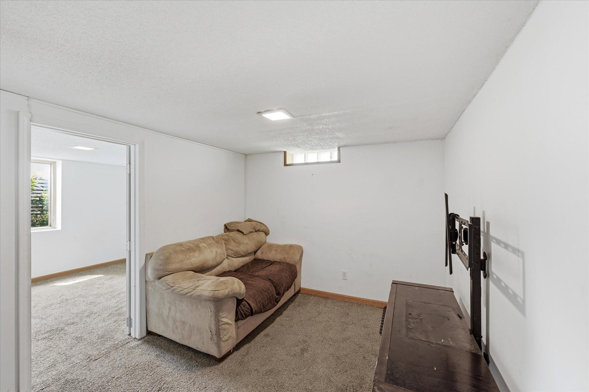 Lower level features family room, 2 bedrooms, laundry, utility room. Water heater replaced in 2018. New washer 2025.