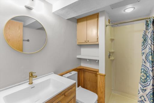A 3/4 bathroom in the lower level.