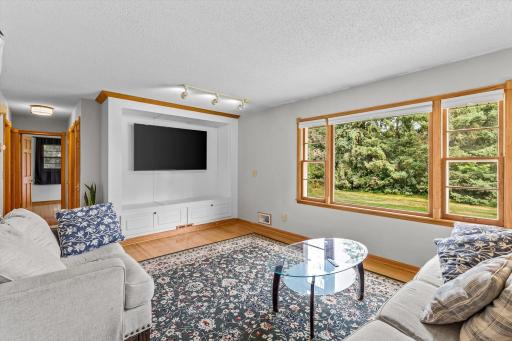 Beautiful hardwood floors and a fantastic media center in the living room!