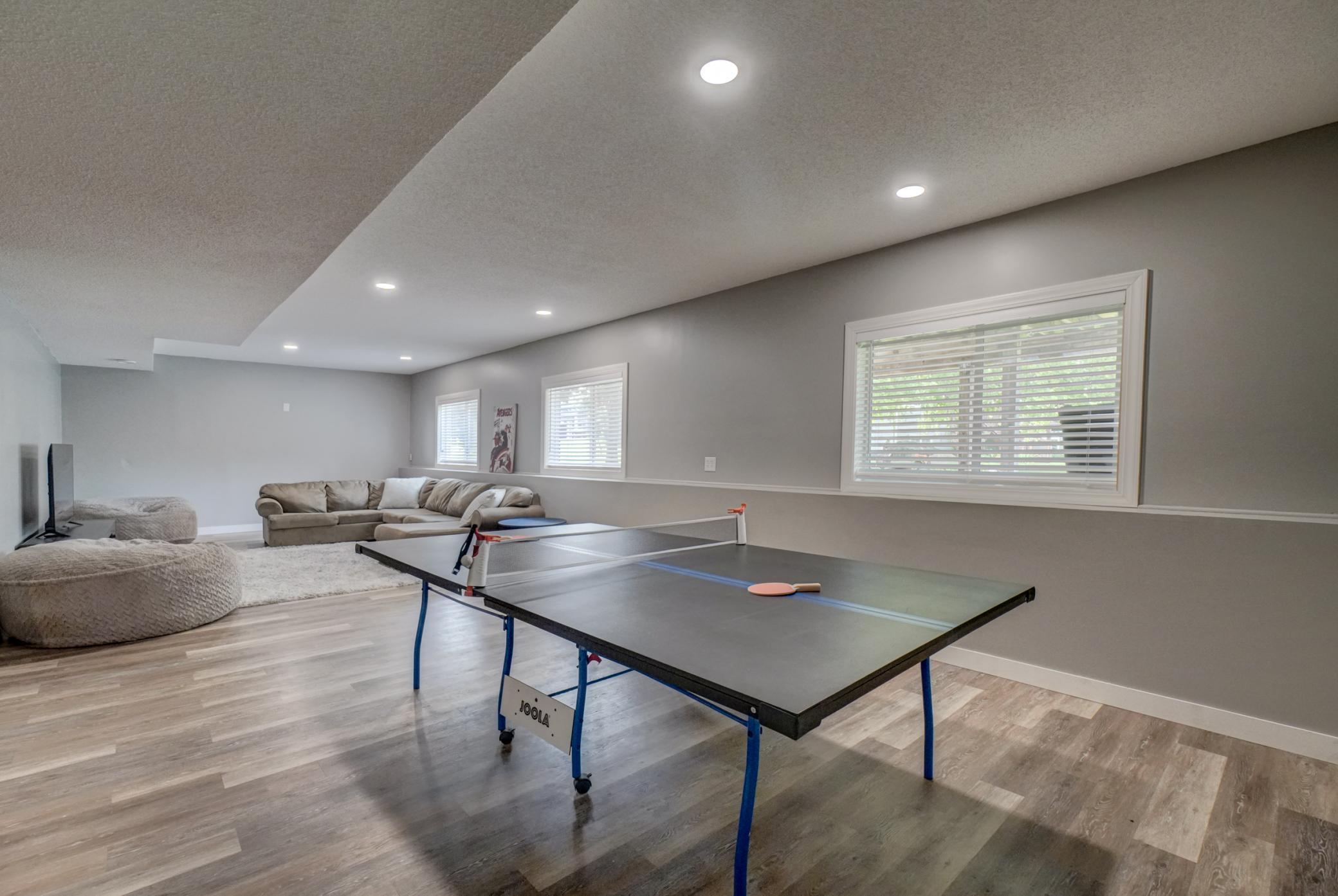 Enjoy endless possibilities in the expansive lower-level living space designed for recreation, relaxation, and everyday enjoyment