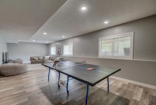Enjoy endless possibilities in the expansive lower-level living space designed for recreation, relaxation, and everyday enjoyment