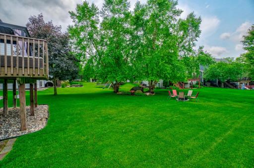 The backyard provides the perfect setting for outdoor gatherings, relaxing evenings, and summer enjoyment!