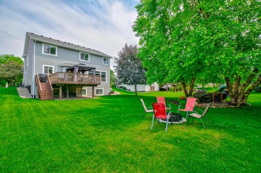Create lasting memories in the inviting backyard, ideal for outdoor gatherings and quiet evenings alike!