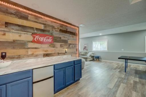 Take entertaining to the next level with the stylish lower-level bar