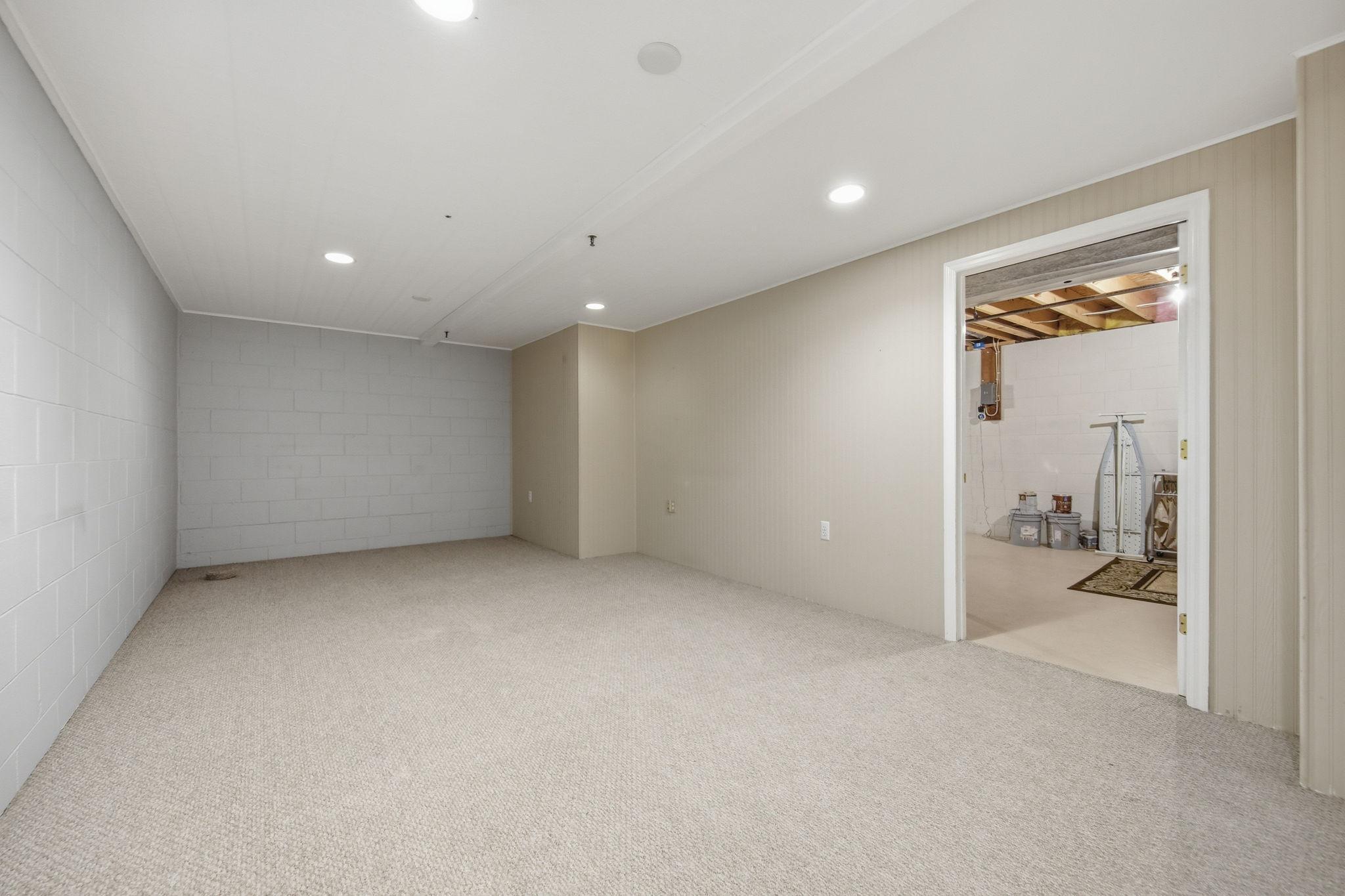Customize the space to fit your lifestyle—perfect as a family room, office, gym, workshop, craft room, or non-conforming bedroom.