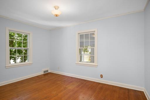 Refinish the floors or install new carpet in the fourth bedroom.