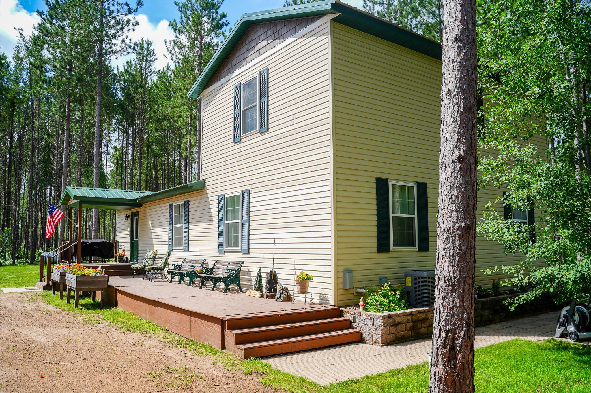 Front Porch leading to Patio Pavers and Raised Garden Bed
