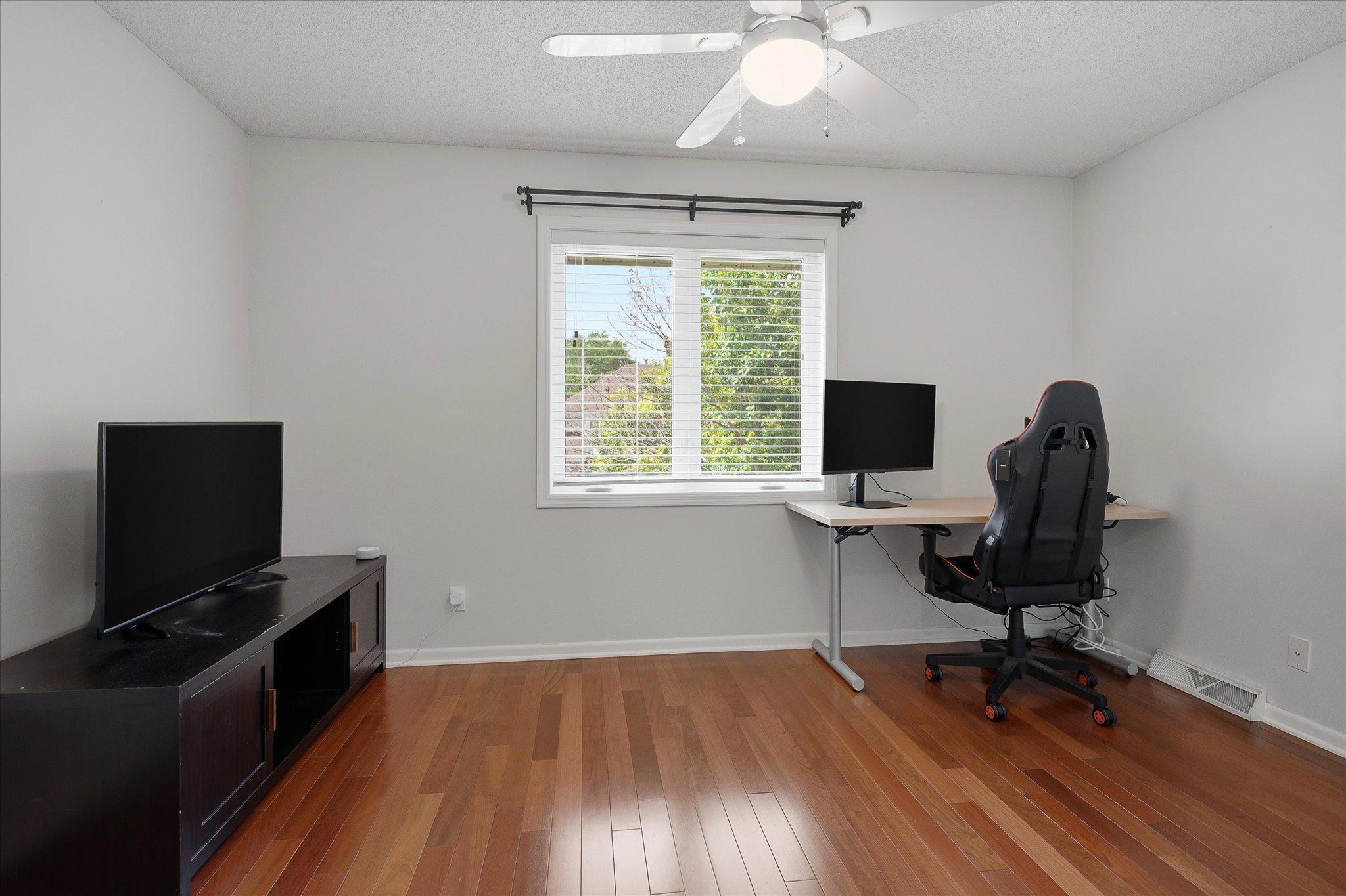 Fourth upstairs bedroom currently being used for second office.