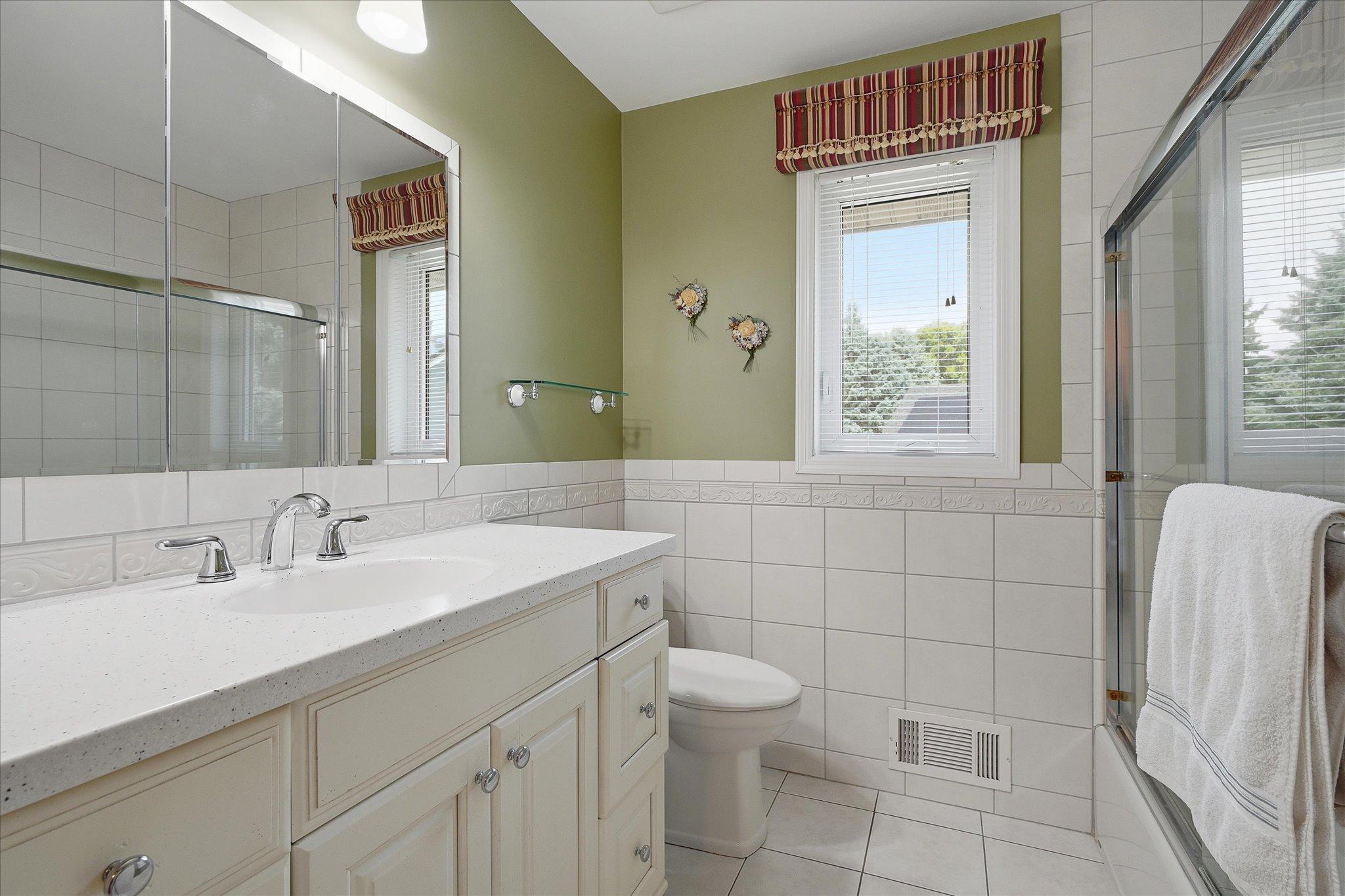Second full bath on upper level.