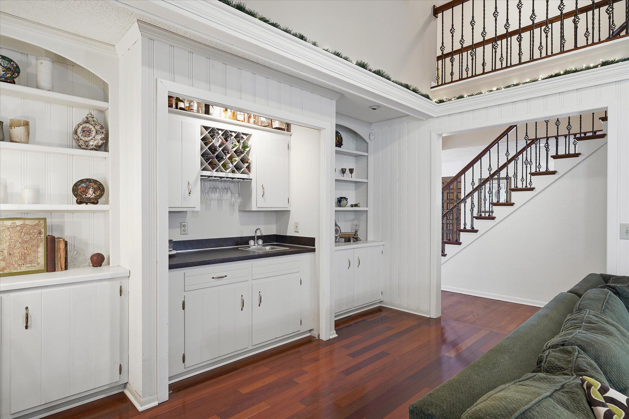 Wet bar in the back of the family room for easy entertaining.