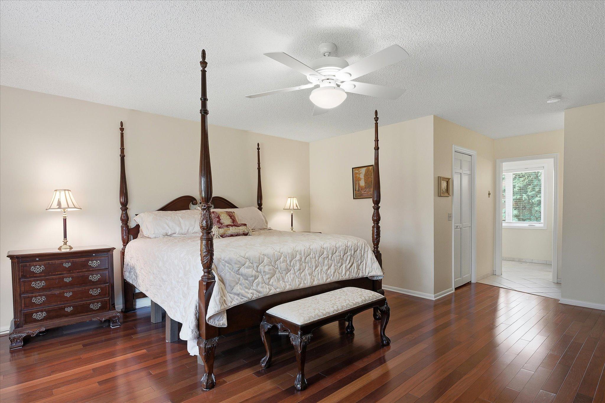 Main bedroom with walk in closet and private bath