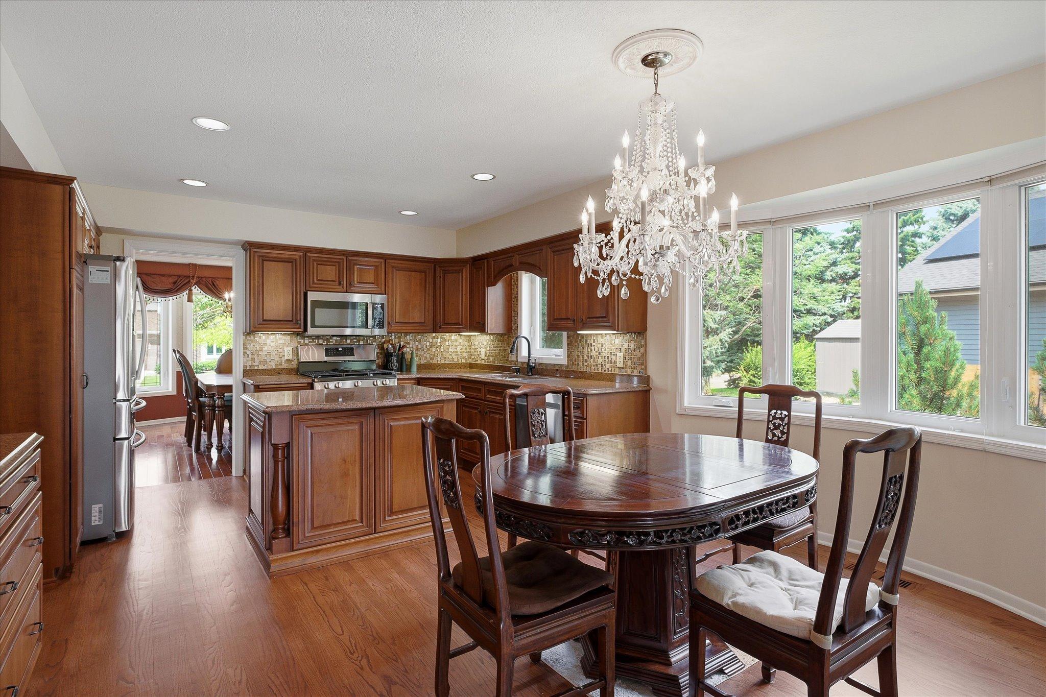 Separate eating area adjoins the open concept kitchen.