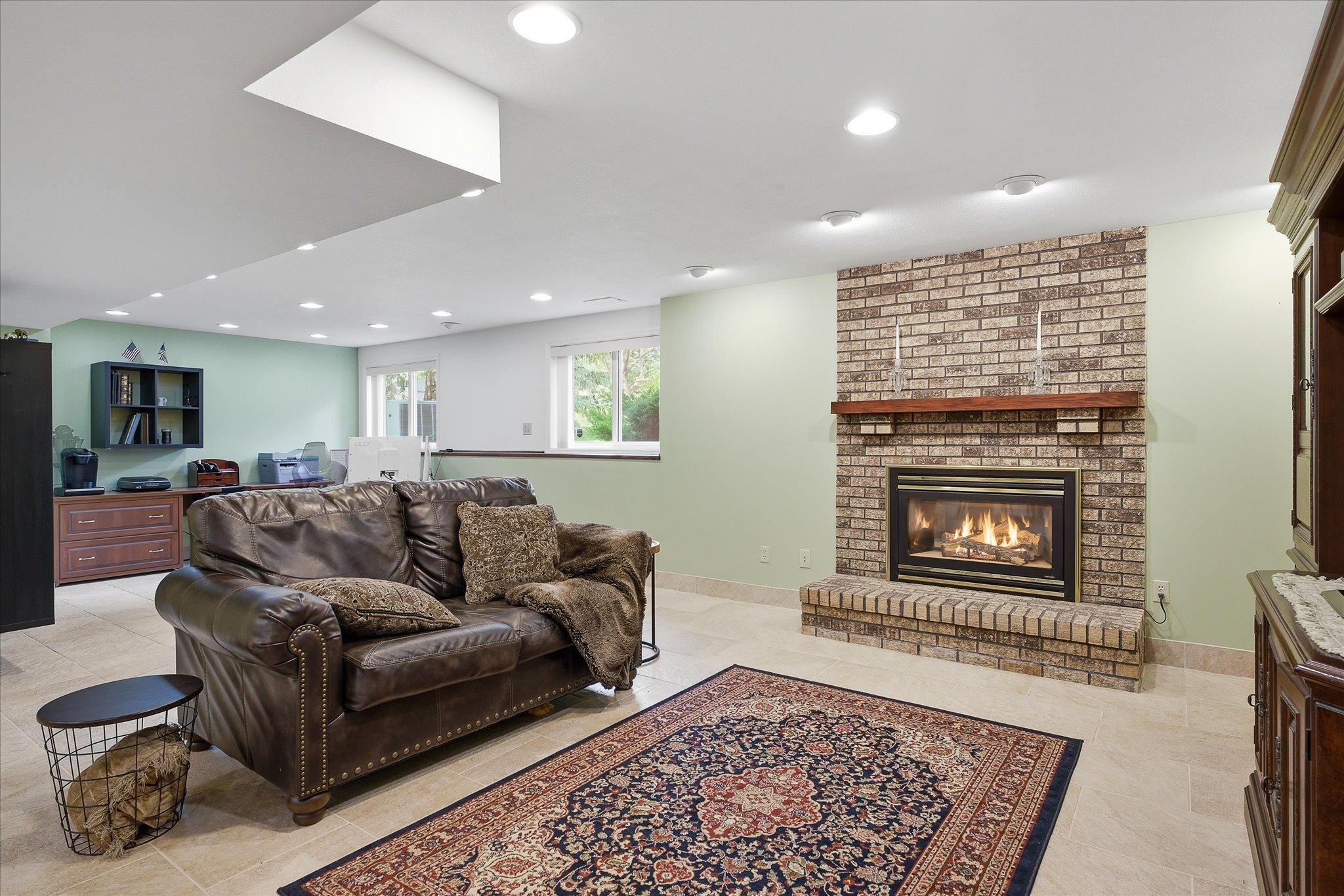 Second family room with gas burning fireplace.