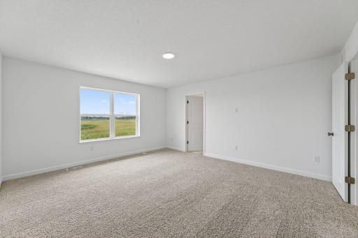 (Photo of a similar home, actual finishes may vary)