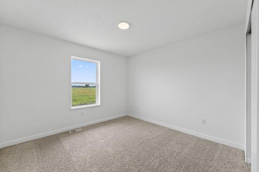 (Photo of a similar home, actual finishes may vary)