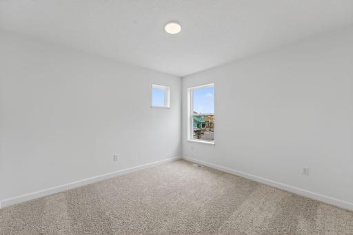 (Photo of a similar home, actual finishes may vary)