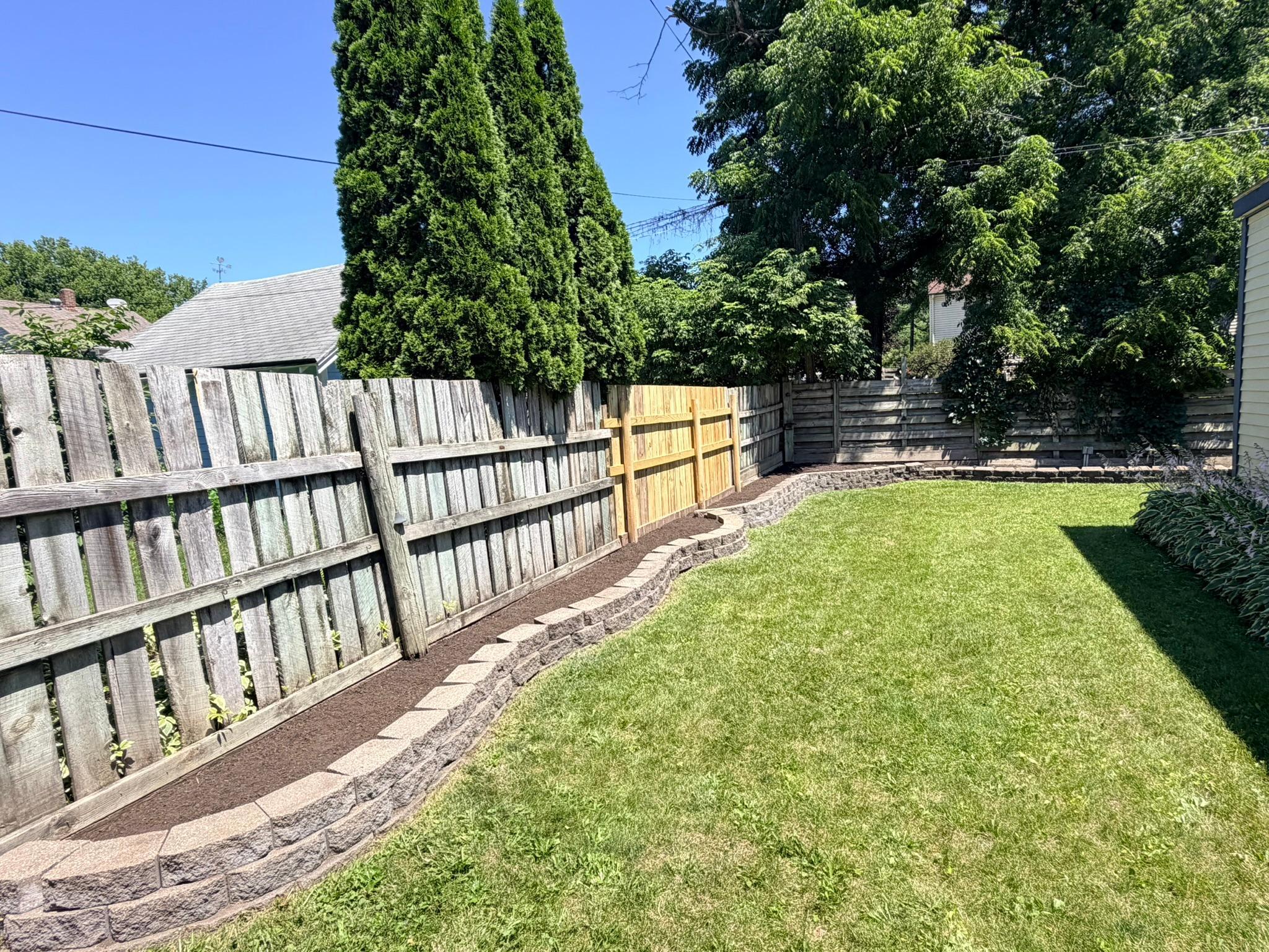 Private Backyard with Large Raised Garden