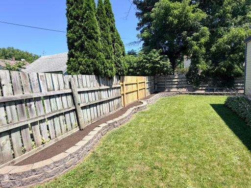 Private Backyard with Large Raised Garden