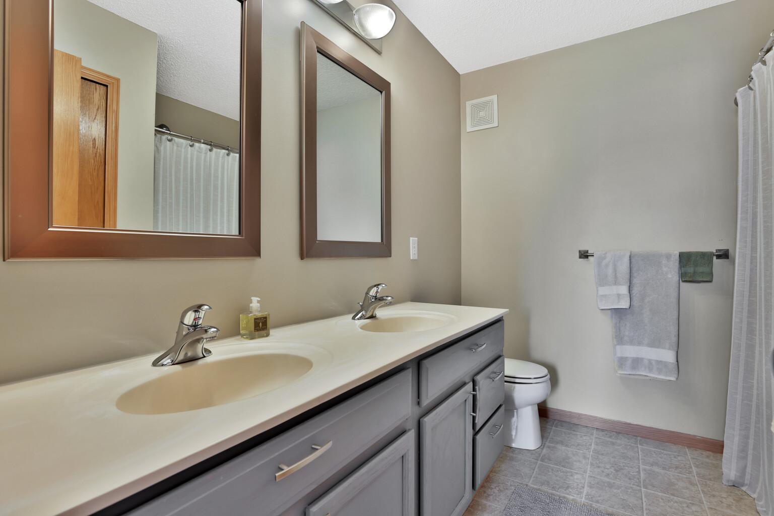 Double sinks and plenty of counter top space.