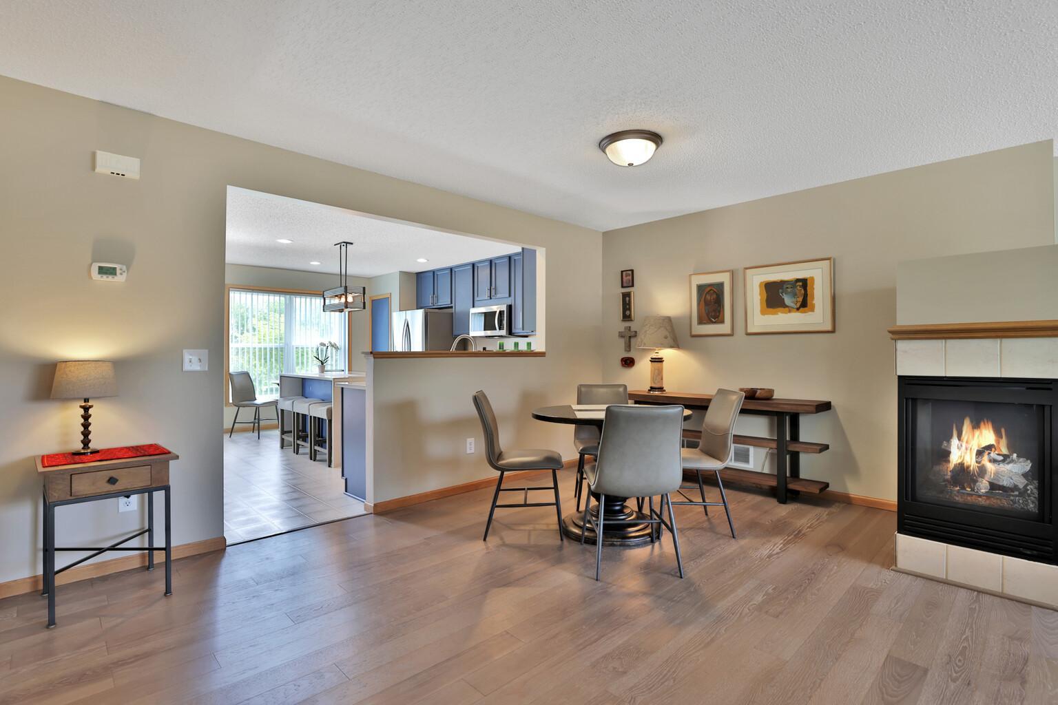 Half wall from kitchen to dining/living area for natural light exposure.