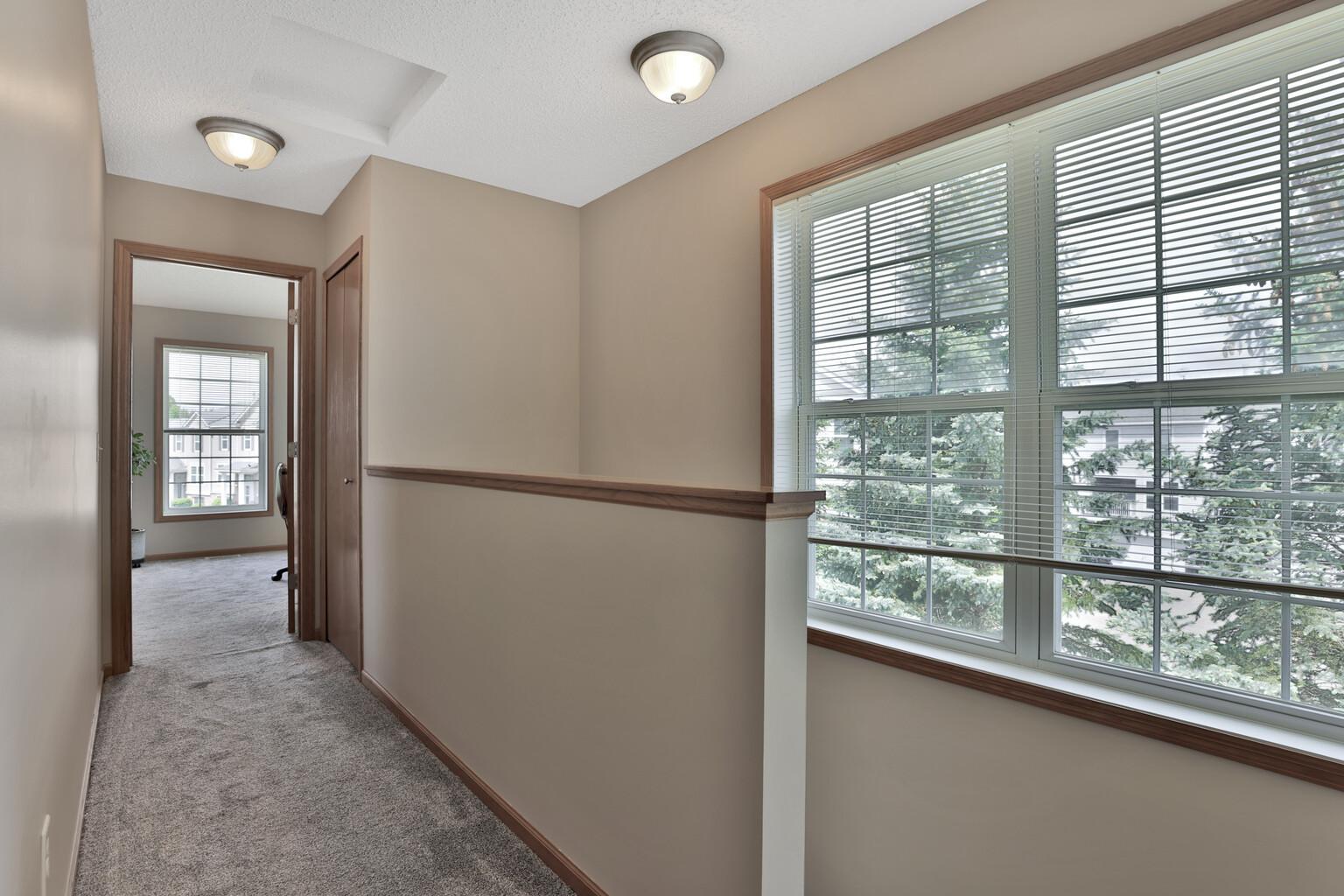 Upstairs hallway and stairwell.