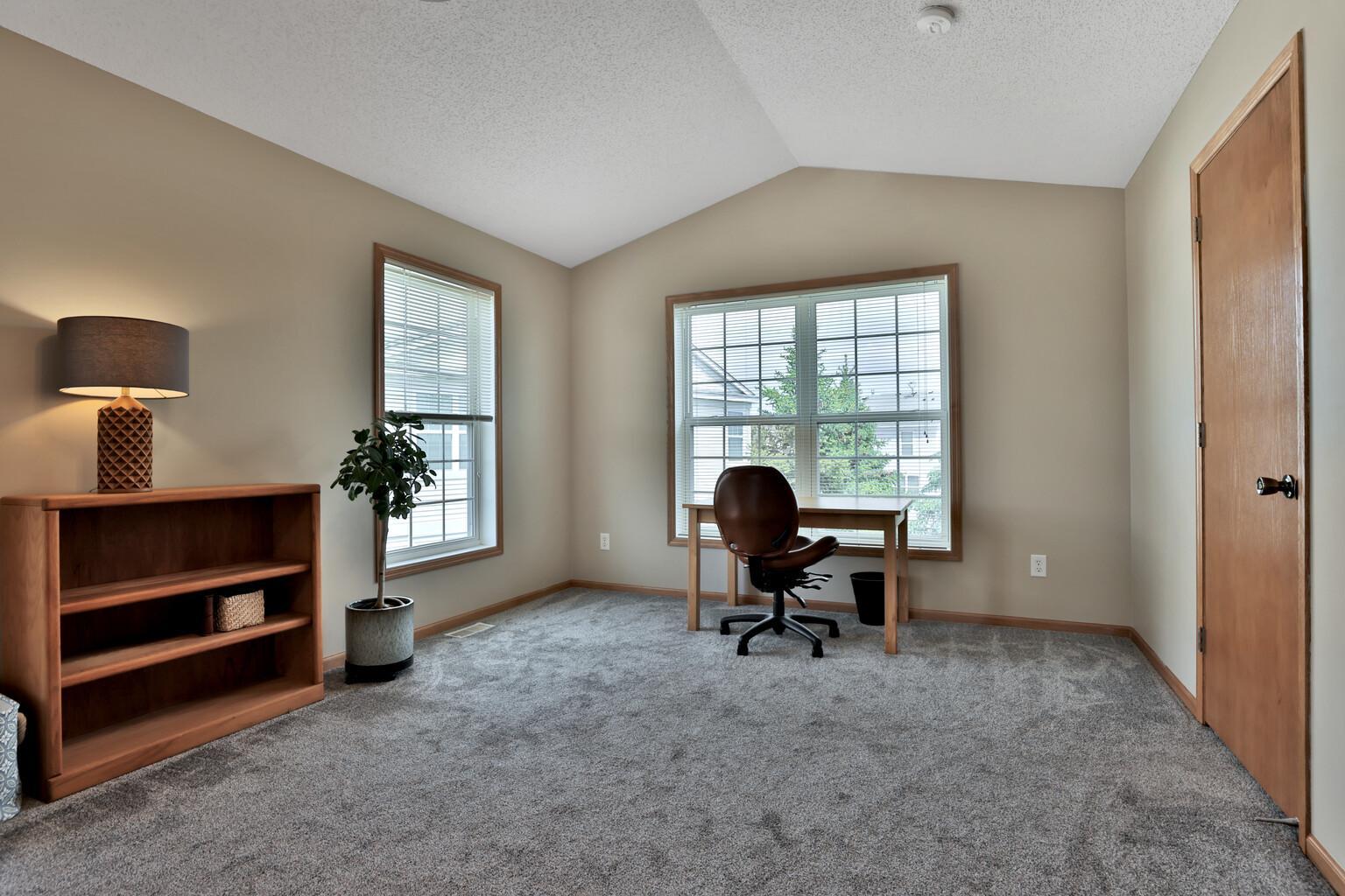 Opposite end of owners suite, large enough for office.