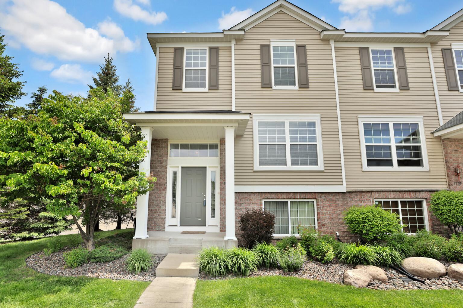 Exceptional end unit in an upscale town home community.