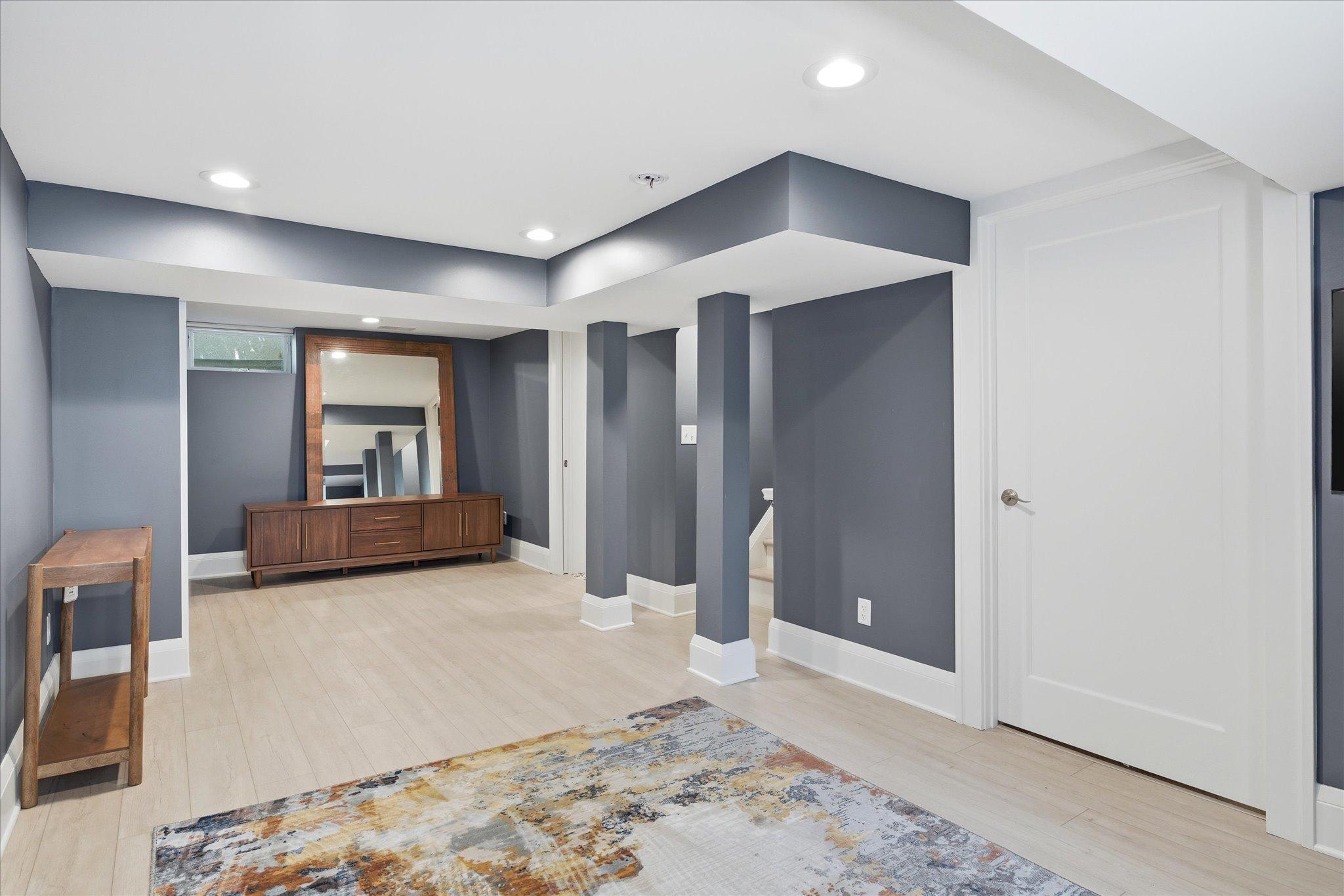 Luxury vinyl floors in the lower level family room