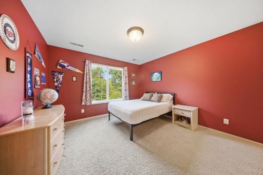 Generously sized bedrooms each offer private vanities and convenient Jack-and-Jill baths.