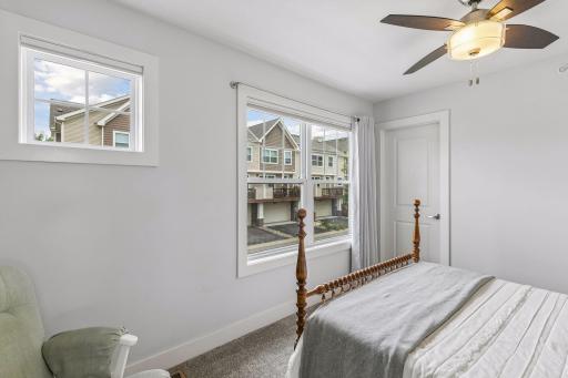 upper level second bedroom with walk in closet