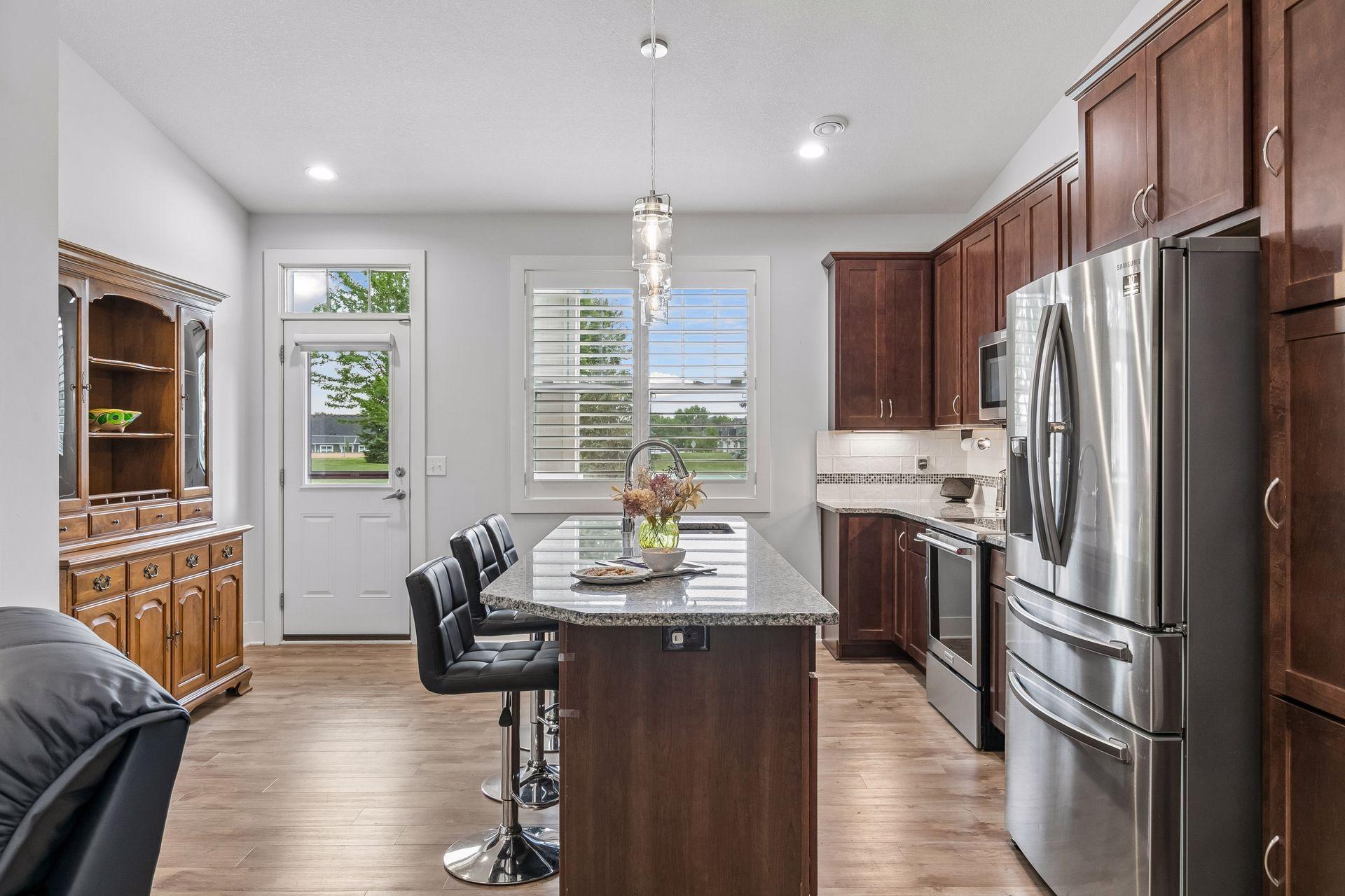 kitchen with access to the pack patio and park areas