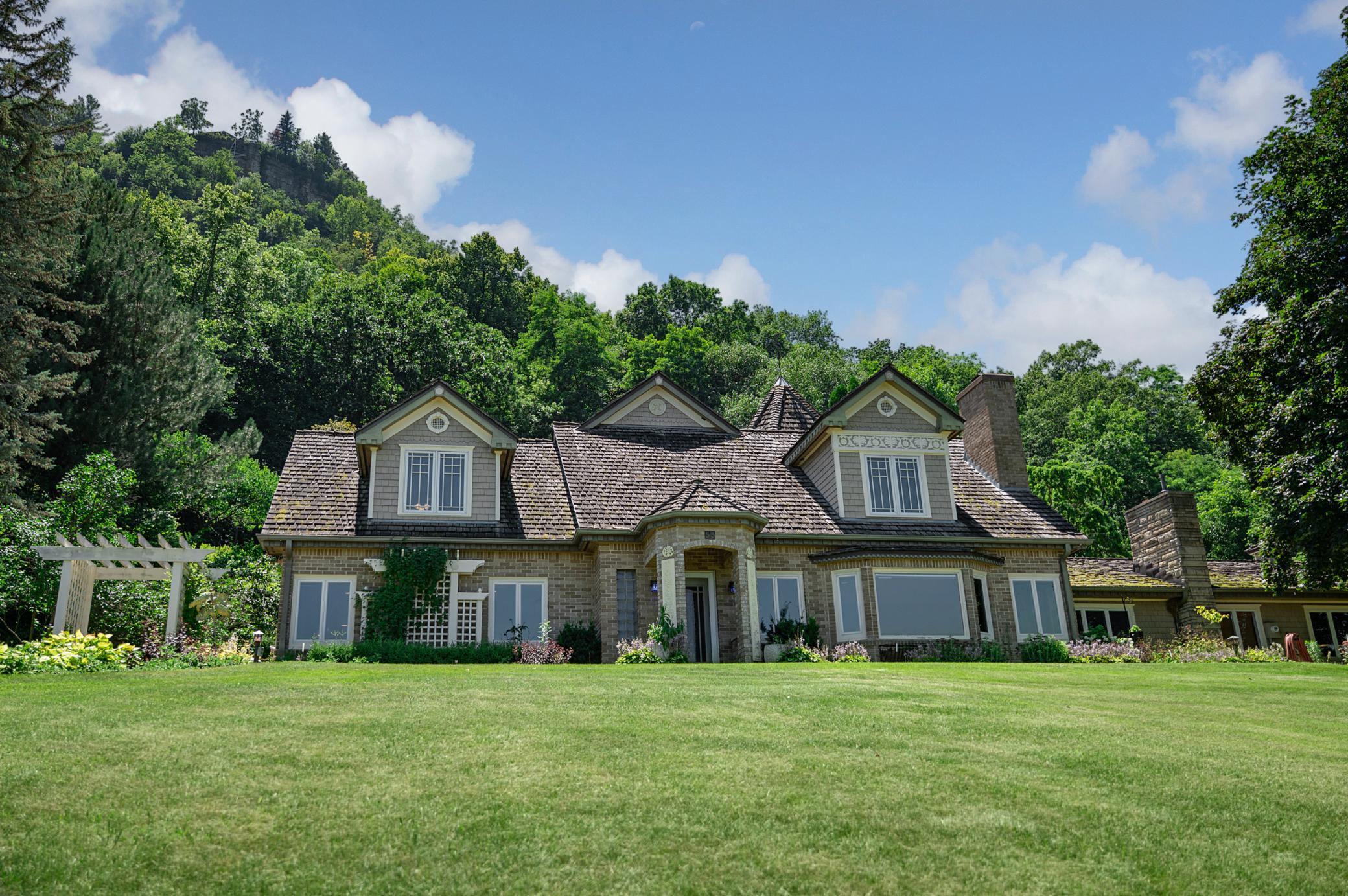 From the road, the original structure of the home can be seen, but so much more is just beyond view.
