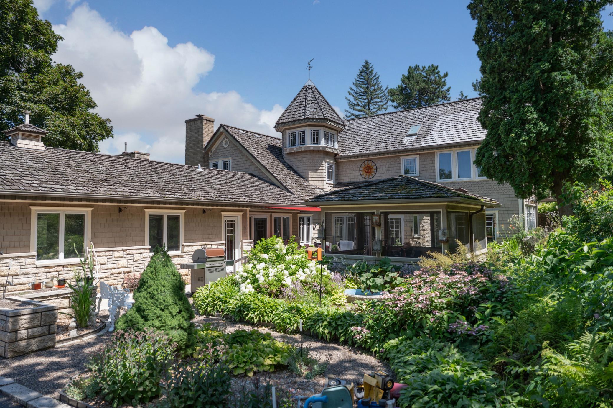 The backyard and entrance is a highlight of this home with comfortable outdoor living spaces everyone will enjoy.
