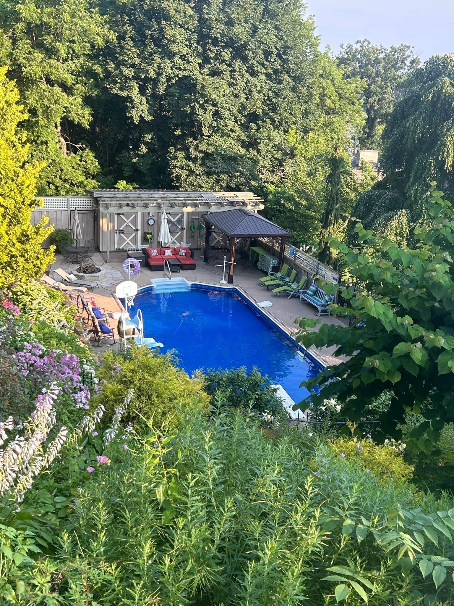Once the stables of the property, the pool house is visually striking and provides changing rooms for guests as well as pool equipment.