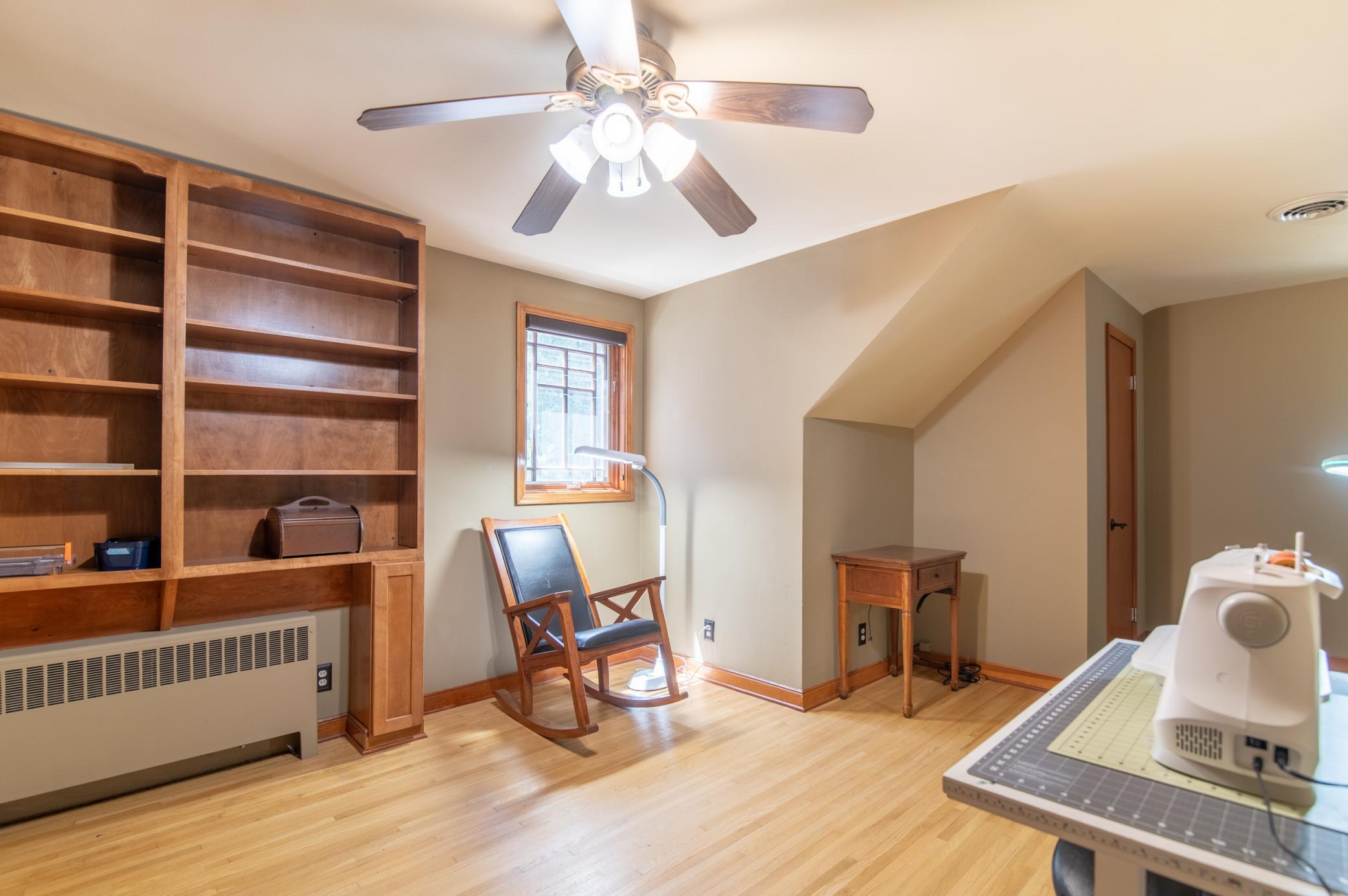 Built-in bookshelves make this great as a sleeping room as well as an office / study.