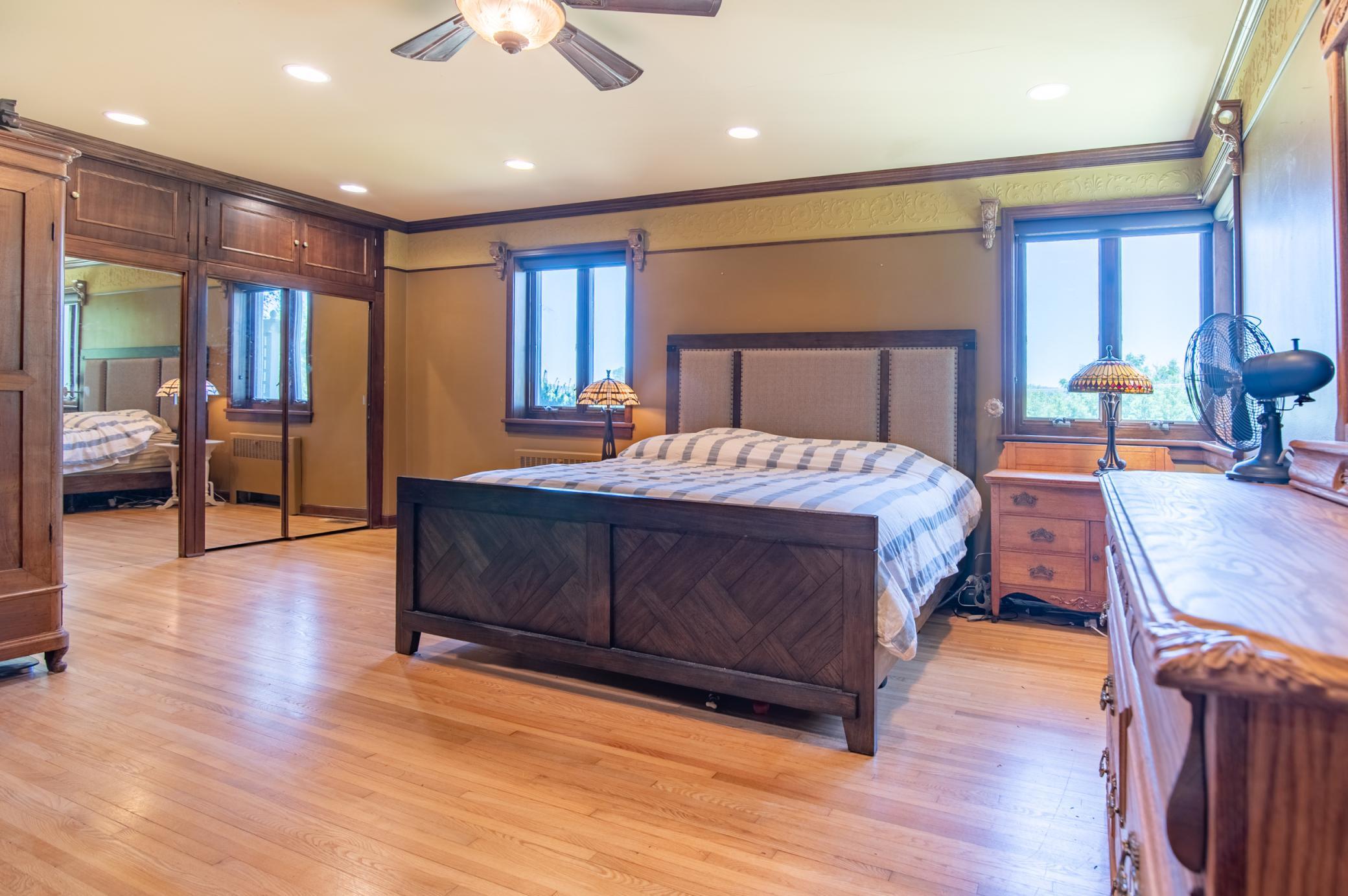With two standard closets (Seen at left of frame) as well as a large walk-in closet, this room has great storage options too.